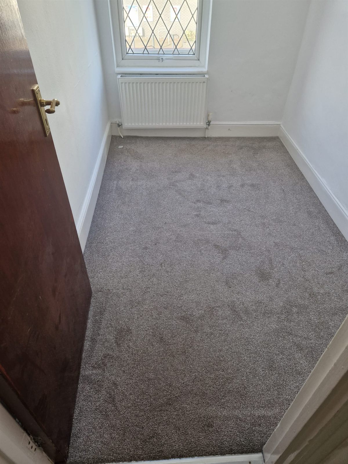 Freshly cleaned and tidied room by Mikin Cleaning Service